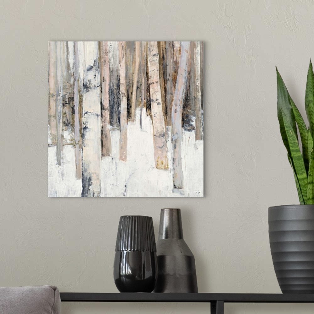 A modern room featuring Square abstract painting of birch trees in the woods covered in snow with warm tones.