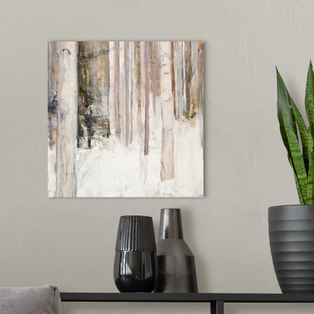 A modern room featuring Square abstract painting of birch trees in the woods covered in snow with warm tones.