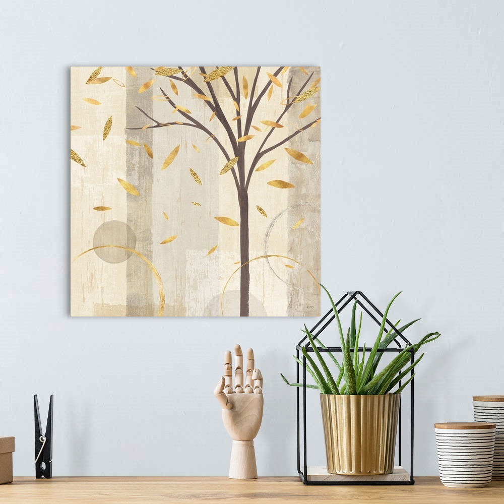 A bohemian room featuring Watercolor painting of a tree shedding metallic gold leaves on a background made with different s...