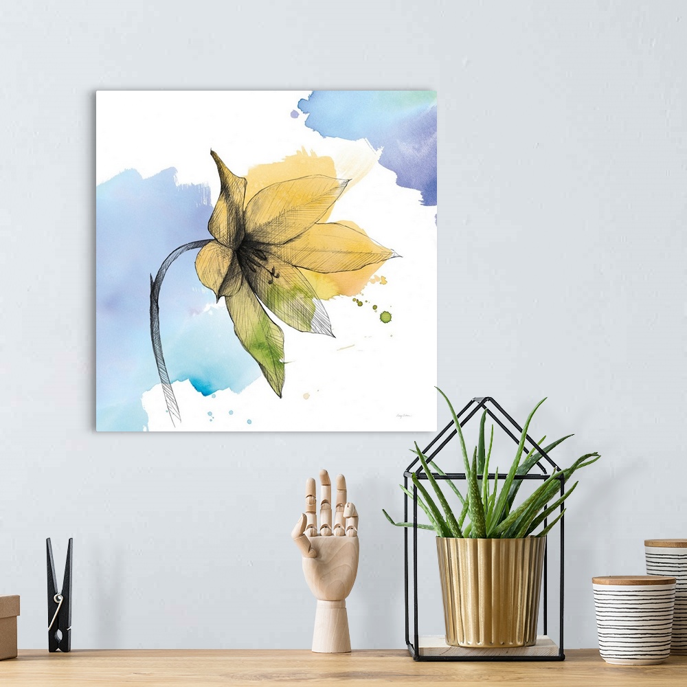 A bohemian room featuring A square watercolor painting of a yellow lily with black sketched lines.