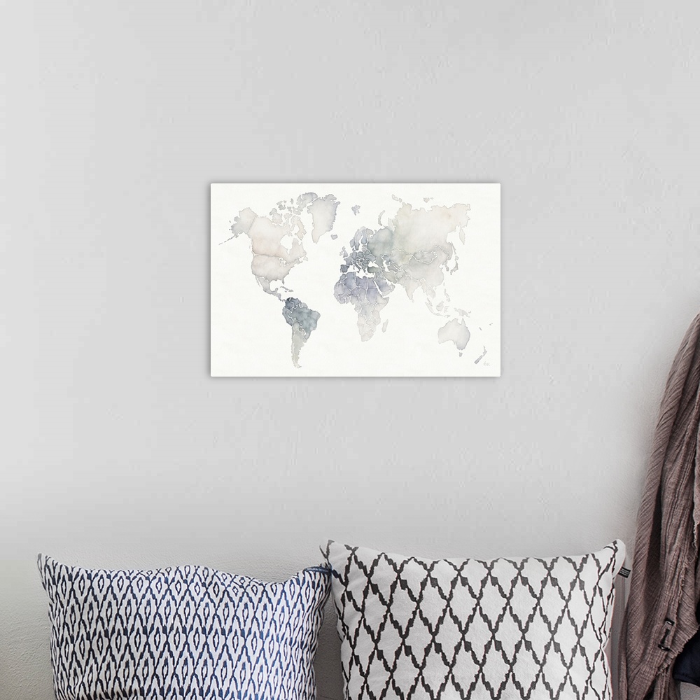 A bohemian room featuring A muted watercolor painting of the world map on white.