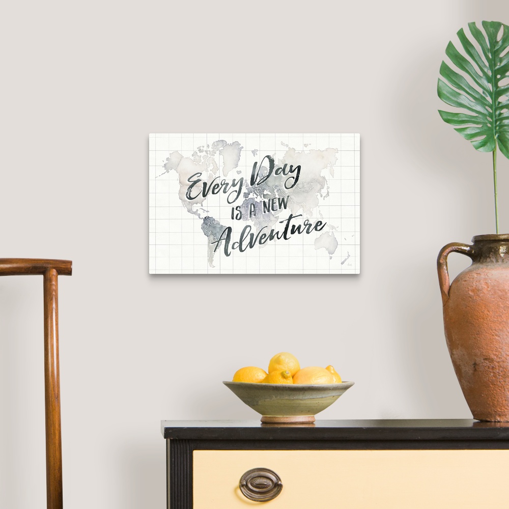 A traditional room featuring "Every Day is a New Adventure" handwritten on top of a watercolor map of the world with grid lines.