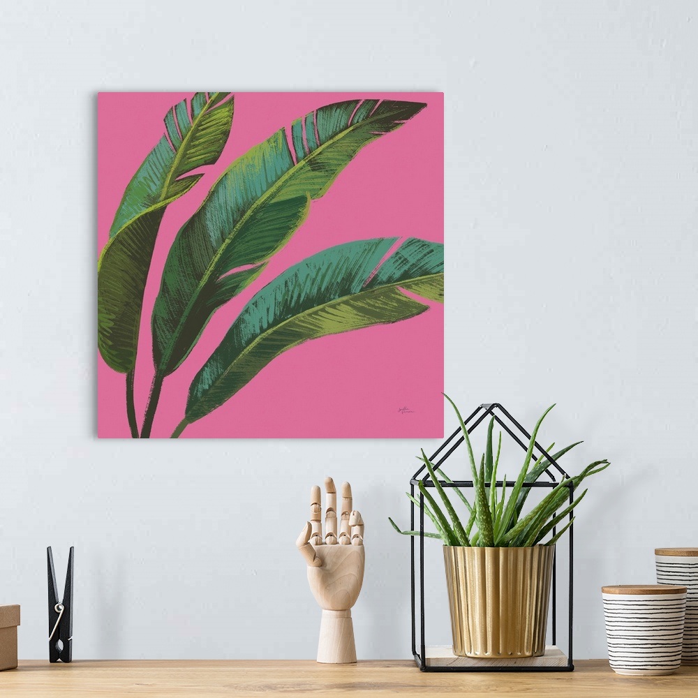 A bohemian room featuring Illustration of palm leaves in shades of green with blue highlights on a bright pink, square back...
