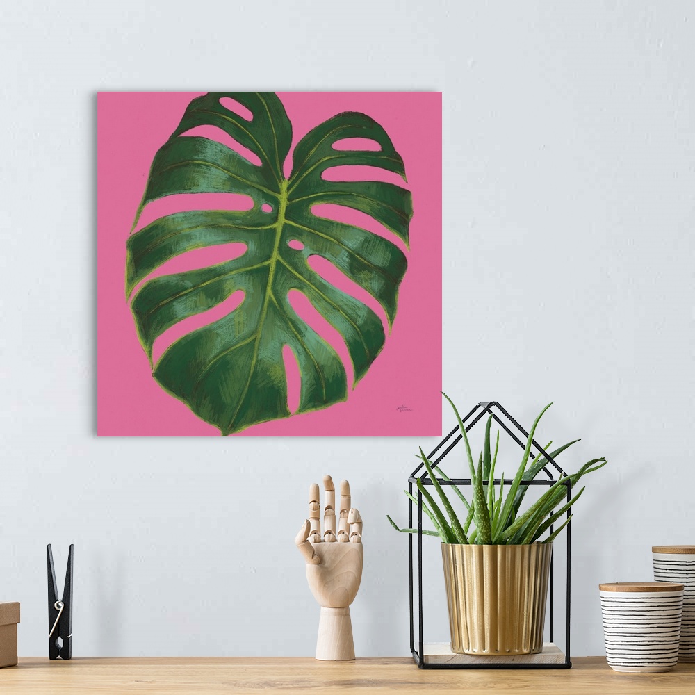 A bohemian room featuring Illustration of a palm leaf in shades of green with blue highlights on a bright pink, square back...