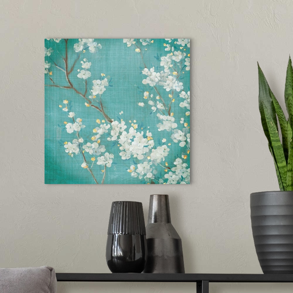 A modern room featuring White Cherry Blossoms II on Blue Aged No Bird