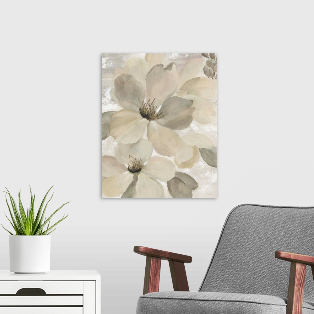 A modern room featuring Contemporary painting of neutral toned magnolia flowers.