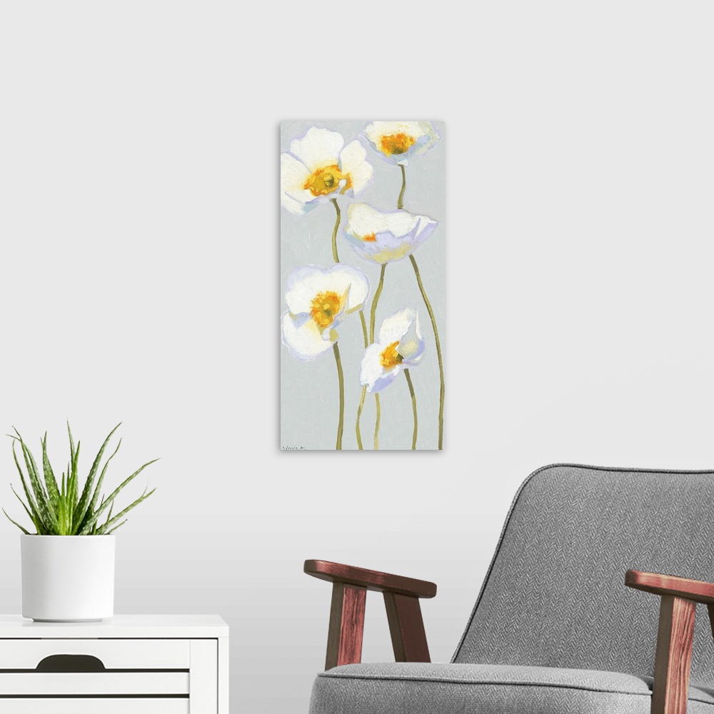 A modern room featuring Giant, vertical, floral painting of five white poppy flowers on thin, waving stems, extending upw...