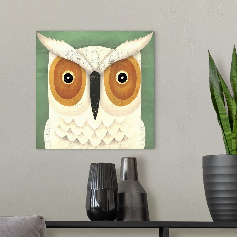 A modern room featuring Contemporary artwork of a white owl with an intense gaze in its eyes.