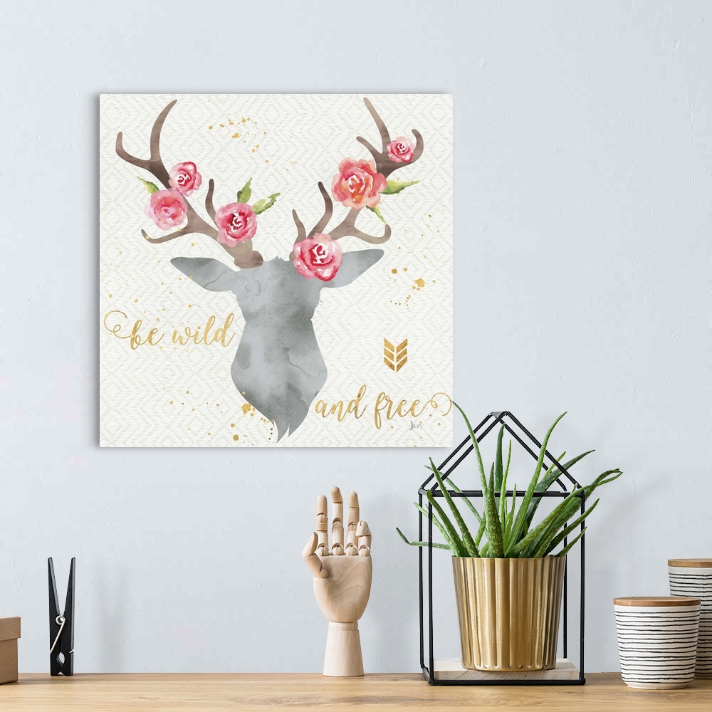 A bohemian room featuring Contemporary home decor artwork of a watercolor stag silhouette with roses in the antlers.