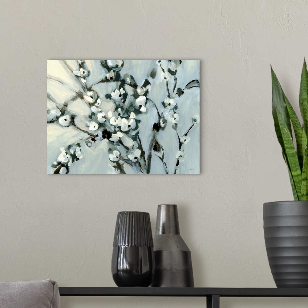 A modern room featuring A bold contemporary painting of branches of white flowers against a grey background