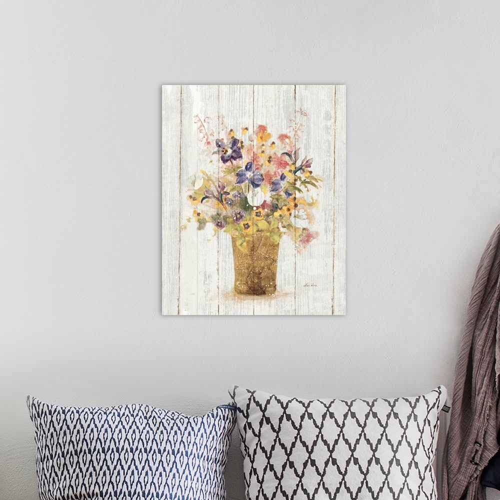 A bohemian room featuring A painting of a vase of wildflowers with a distressed appearance on a wood panel background.