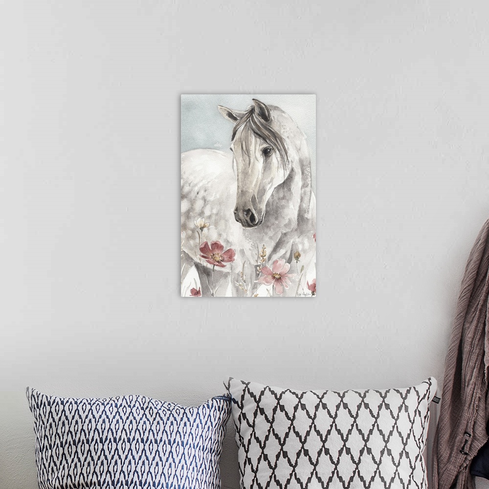 A bohemian room featuring Contemporary watercolor artwork of a white horse in a field of wildflowers.