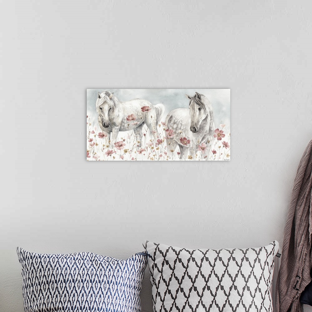 A bohemian room featuring Contemporary watercolor artwork of two white horses in a field of wildflowers.
