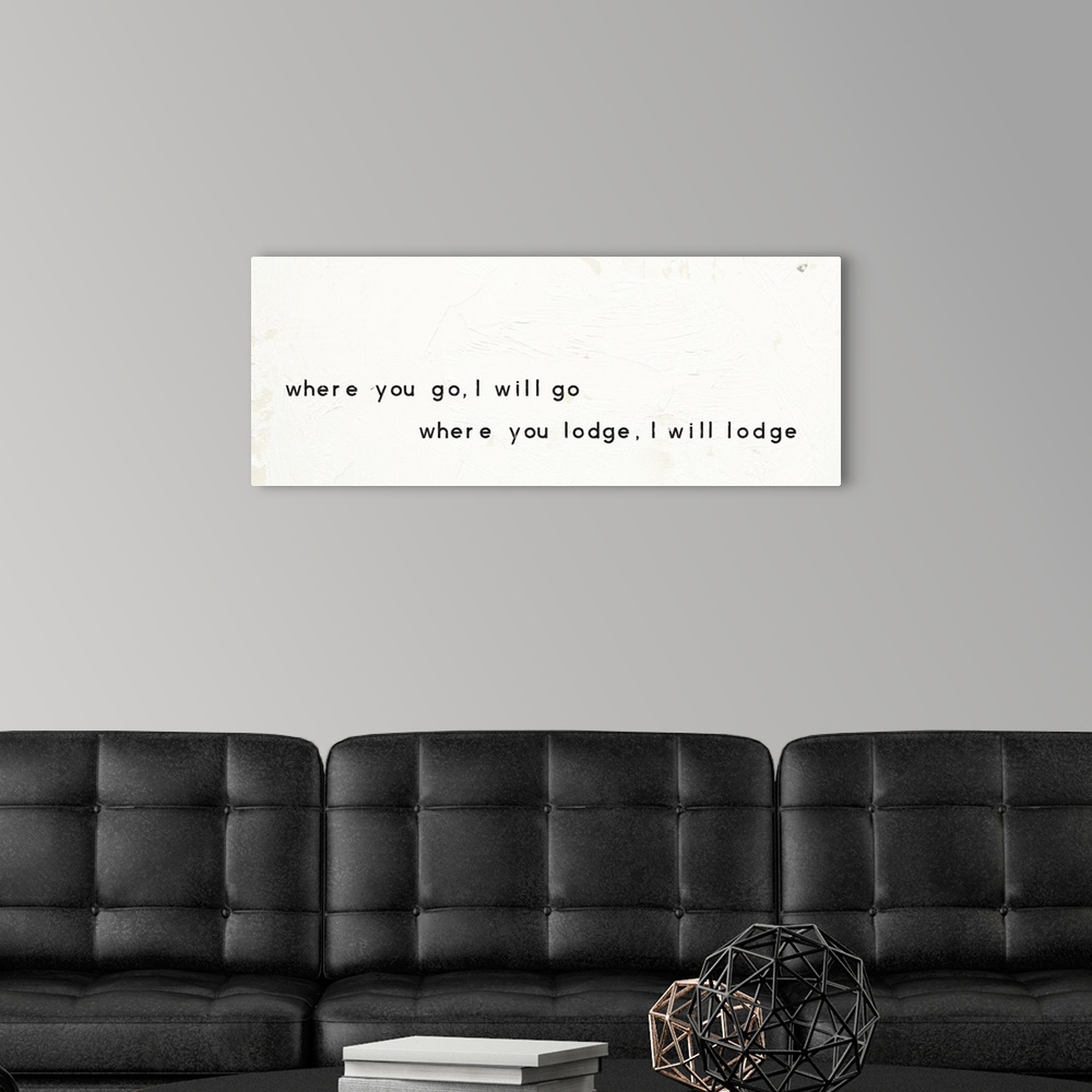 A modern room featuring "Where You Go, I Will Go Where You Lodge, I Will Lodge" written on a painted white texture backgr...