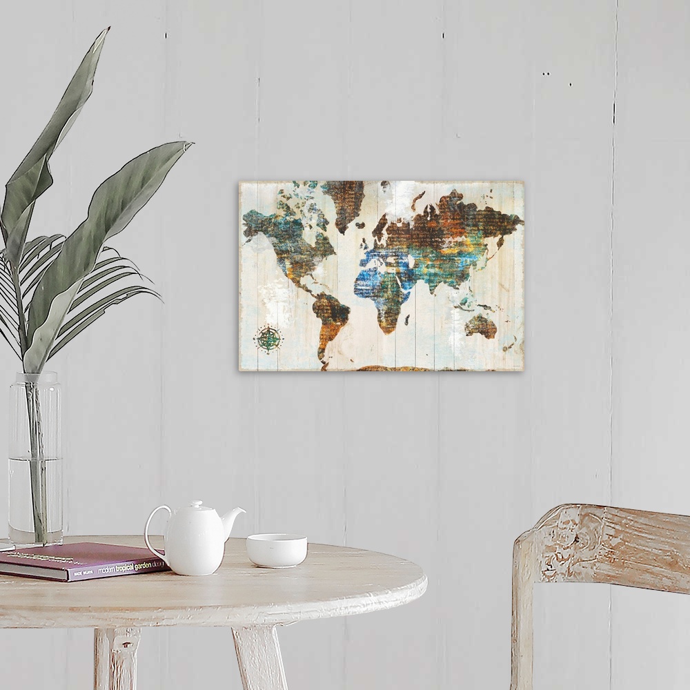 A farmhouse room featuring World map made of multi-color textures with text peeping through, on a wood plank backdrop.
