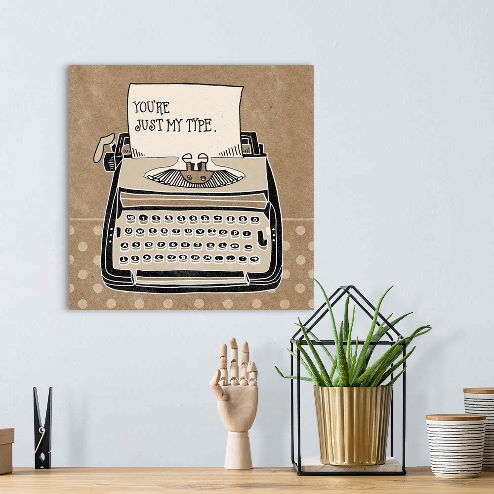 A bohemian room featuring Retro style image of a typewriter with handlettered text.