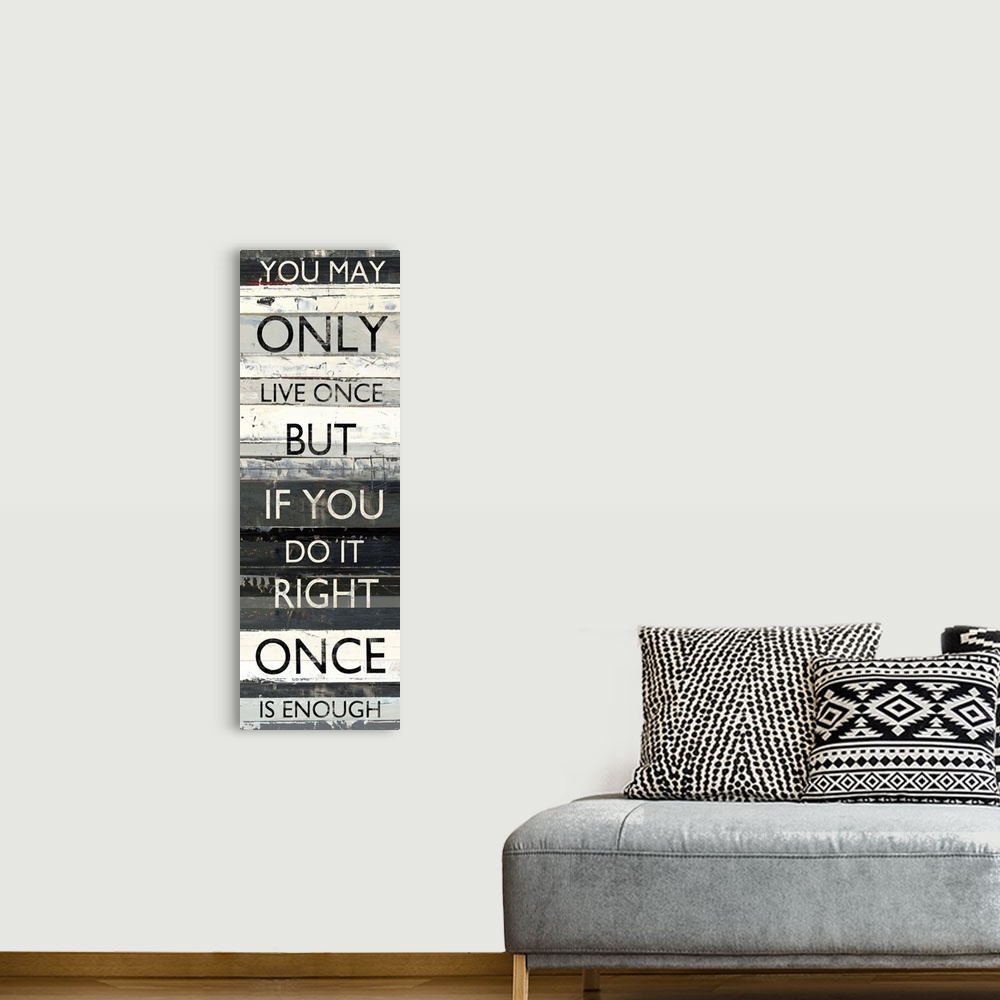 A bohemian room featuring Vertical design featuring stripes of shades of grey paint with inspirational text in a sans-serif...