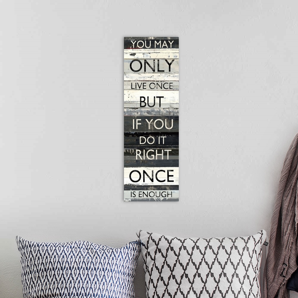 A bohemian room featuring Vertical design featuring stripes of shades of grey paint with inspirational text in a sans-serif...