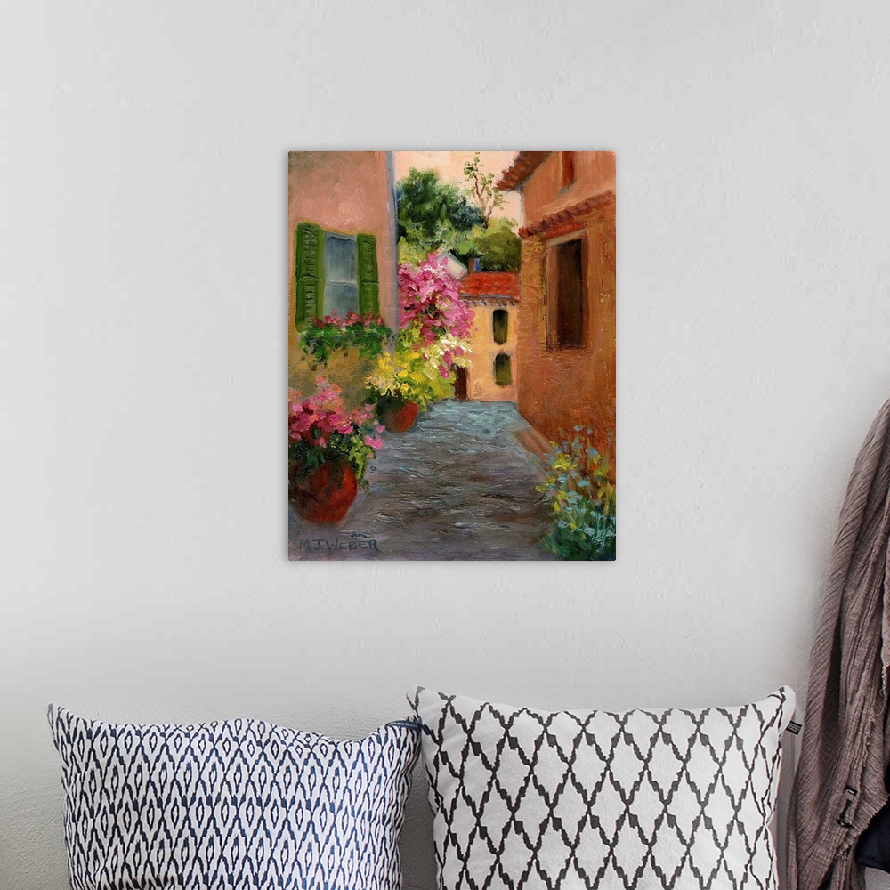 A bohemian room featuring Contemporary painting of an alley in a village with large potted plants.