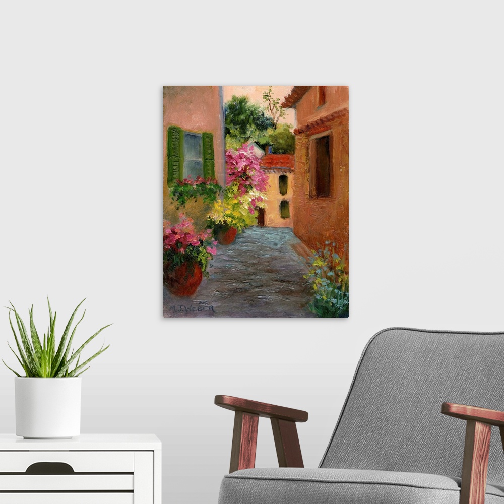 A modern room featuring Contemporary painting of an alley in a village with large potted plants.