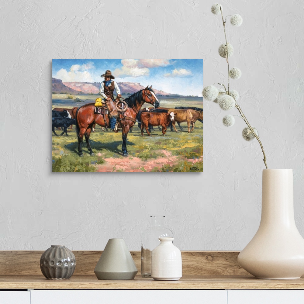 A farmhouse room featuring Contemporary Western artwork of a cowboy on his horse and a herd of cows.
