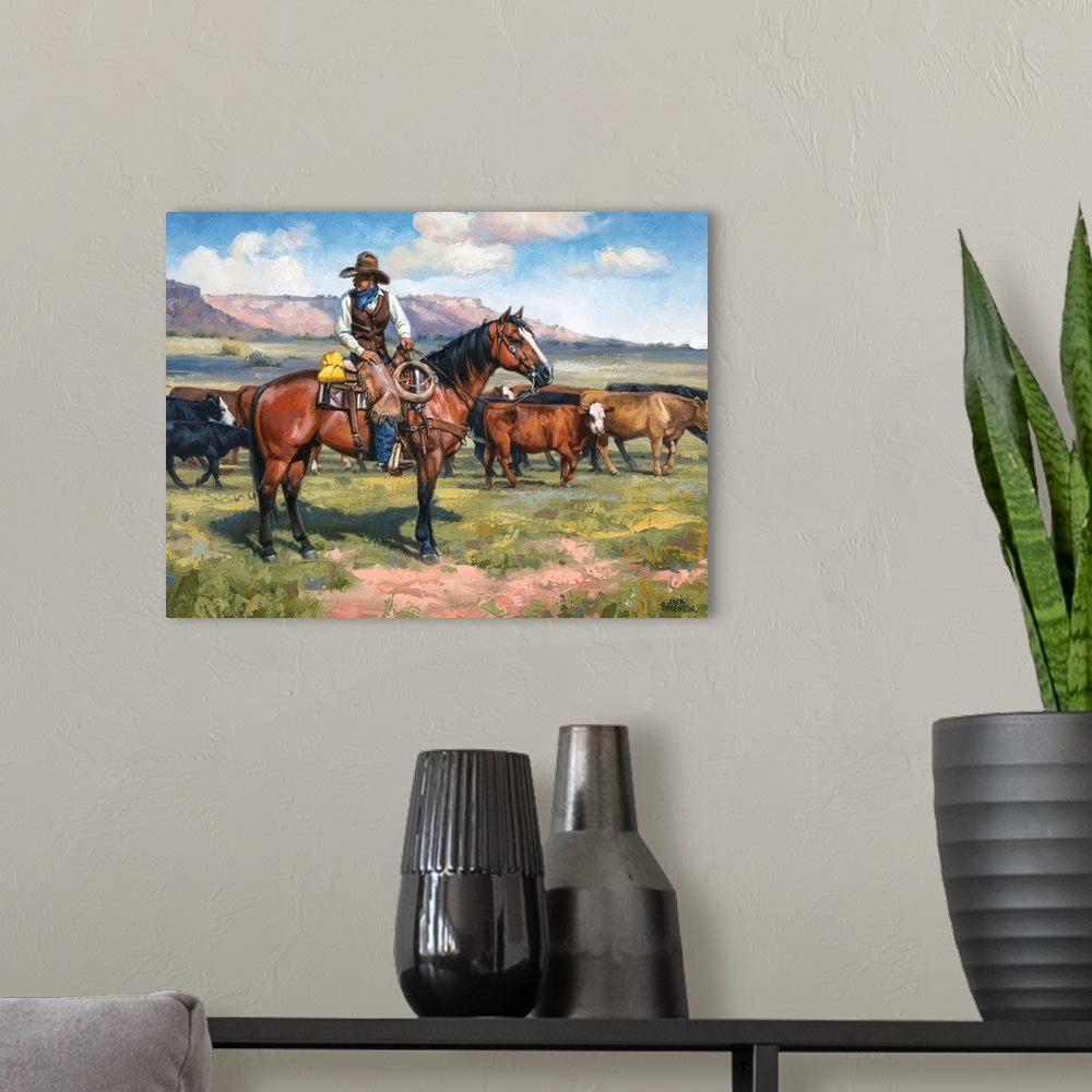A modern room featuring Contemporary Western artwork of a cowboy on his horse and a herd of cows.