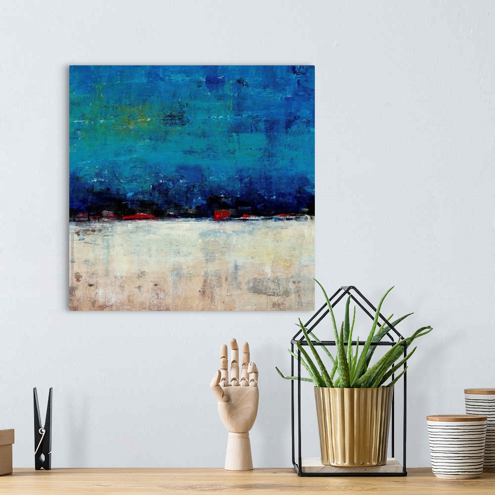 A bohemian room featuring Contemporary abstract painting resembling a white landscape under a deep blue sky.