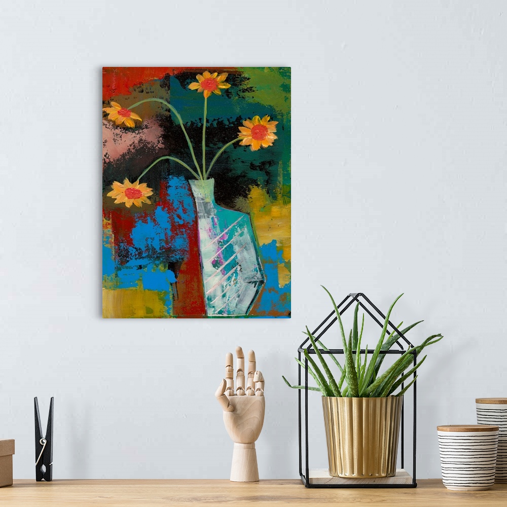 A bohemian room featuring A painting of a vase holding flowers against an abstract background.