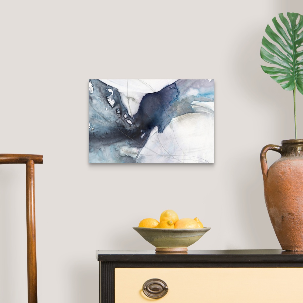 A traditional room featuring Abstract painting featuring a diagonal wave-like shape in a variety of blue shades.