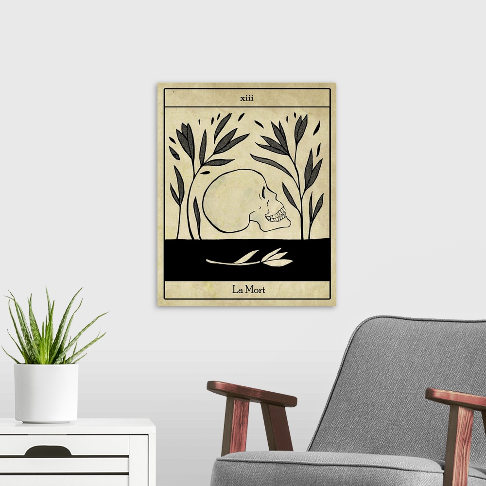 A modern room featuring Halloween themed artwork of a vintage tarot death card with a skull.