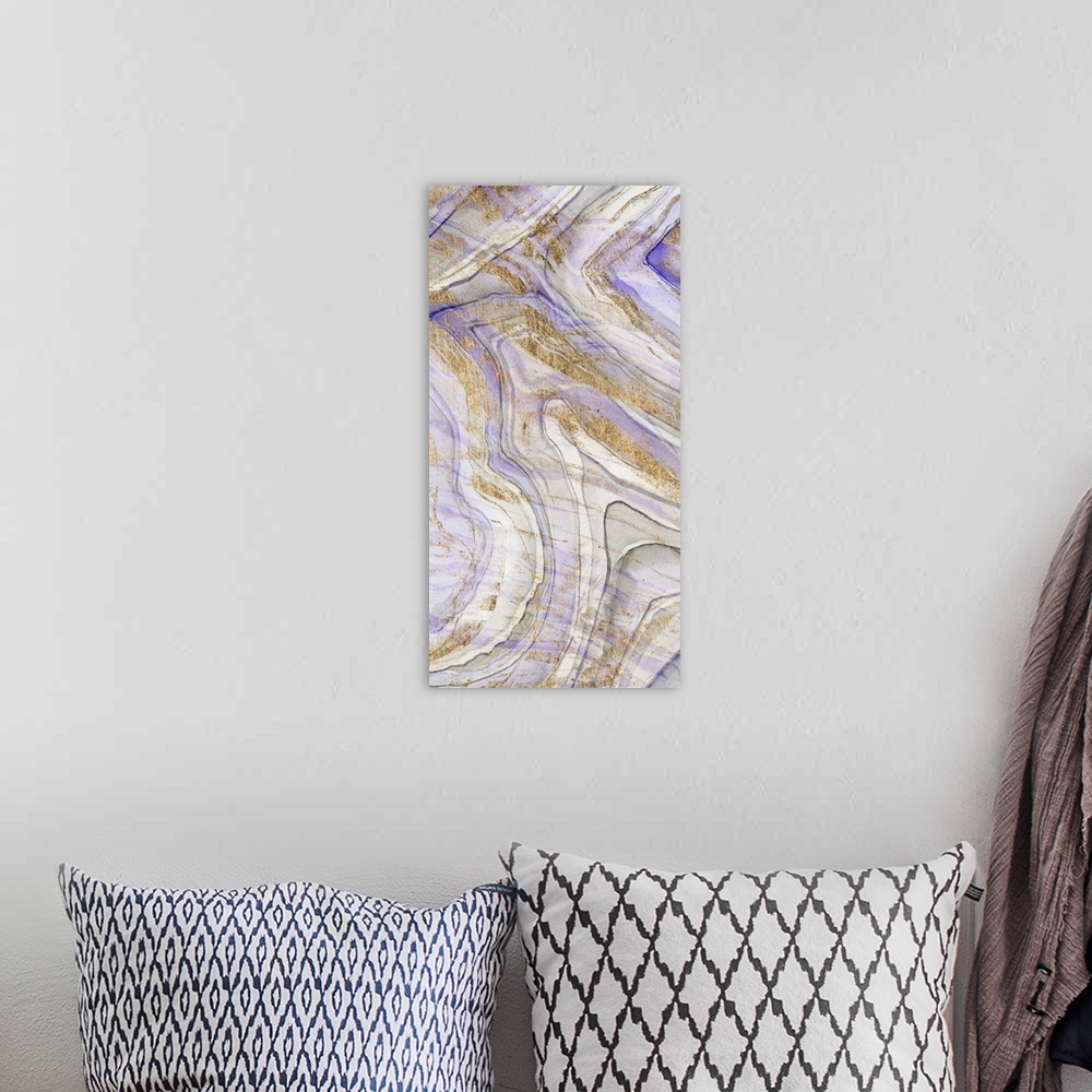 A bohemian room featuring Contemporary abstract artwork of layers of purple and gold, resembling sediments in stone.