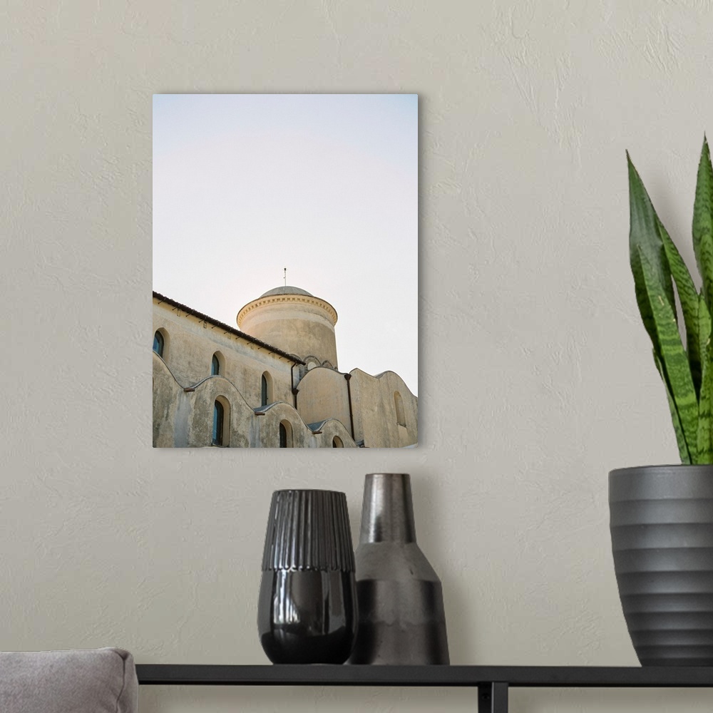 A modern room featuring Photograph of very old buildings in Ravello, Italy.