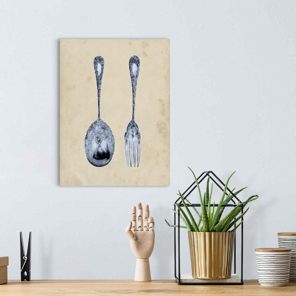 A bohemian room featuring Decorative artwork of an antique fork and spoon with intricate details on an aged sepia background.