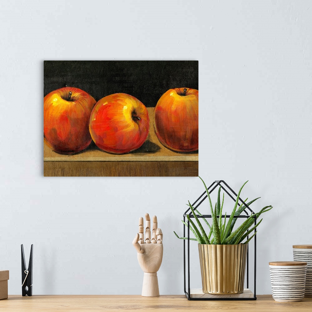 A bohemian room featuring Big still life painting of three apples sitting on a desk on canvas.