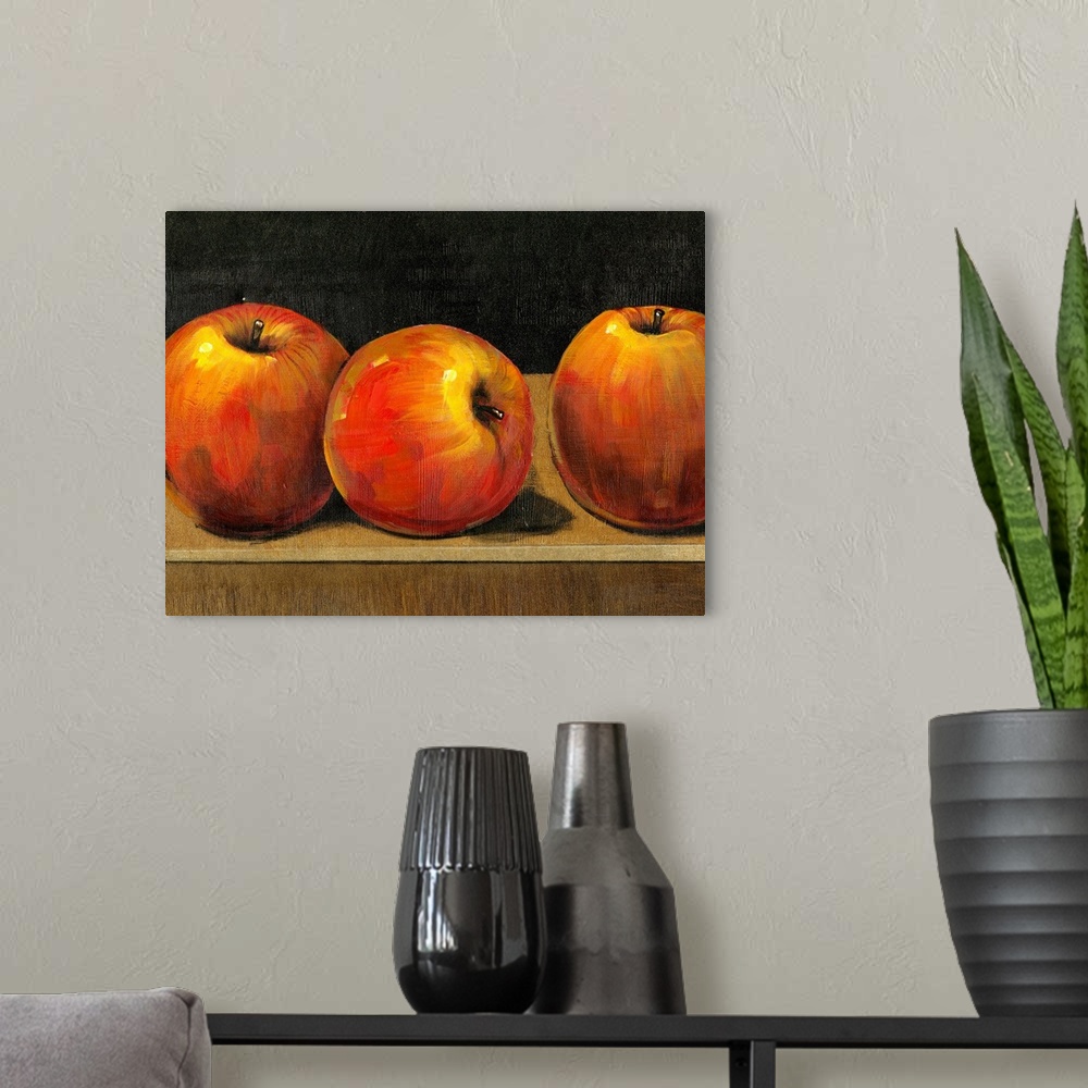 A modern room featuring Big still life painting of three apples sitting on a desk on canvas.