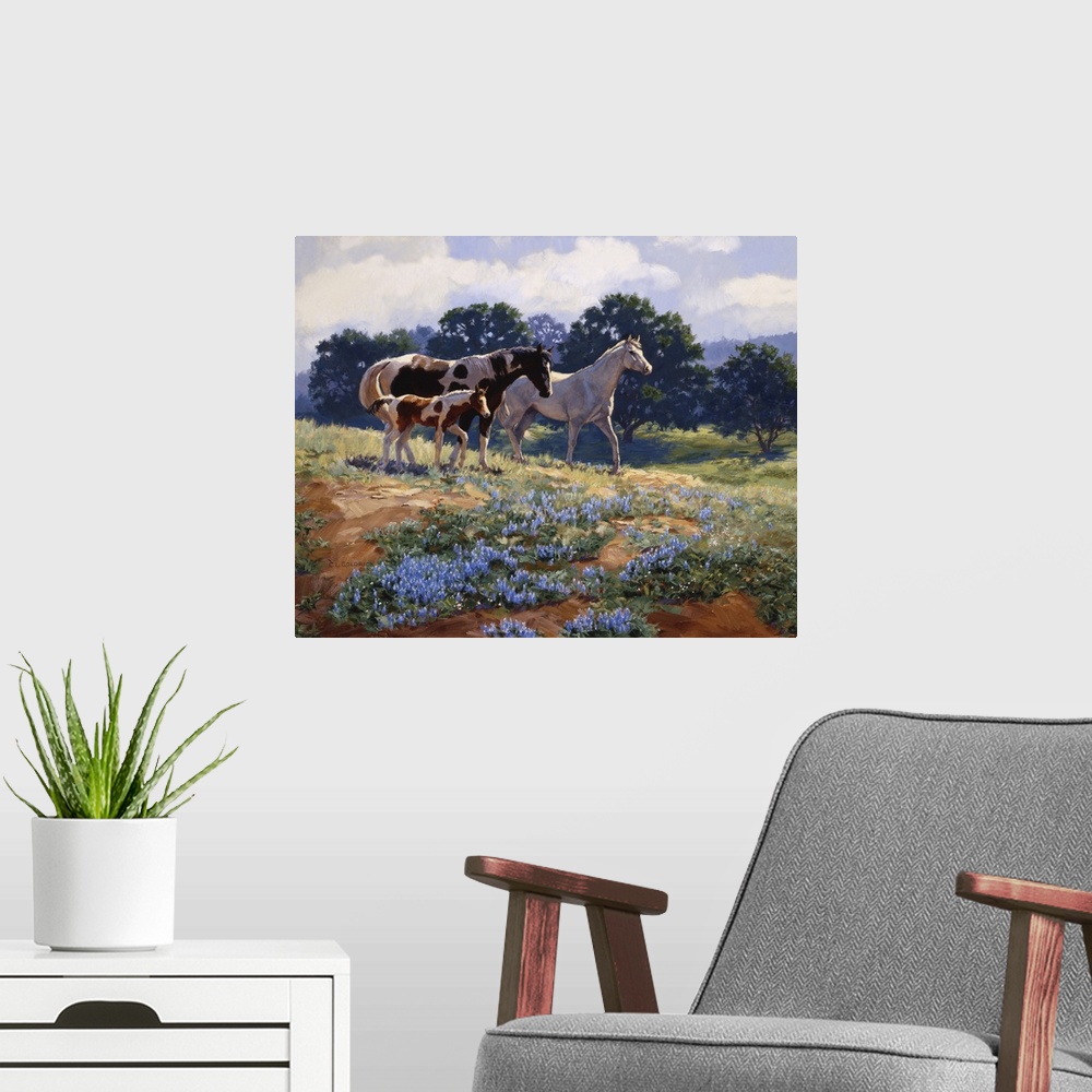 A modern room featuring Contemporary colorful painting of a herd of horses in a countryside clearing.