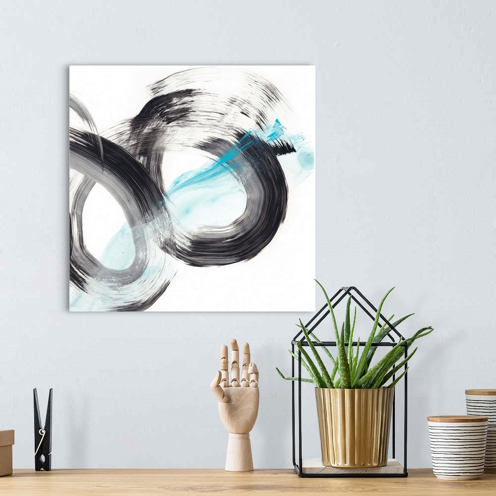 A bohemian room featuring Black and frosty blue spirals make up this dynamic contemporary abstract.