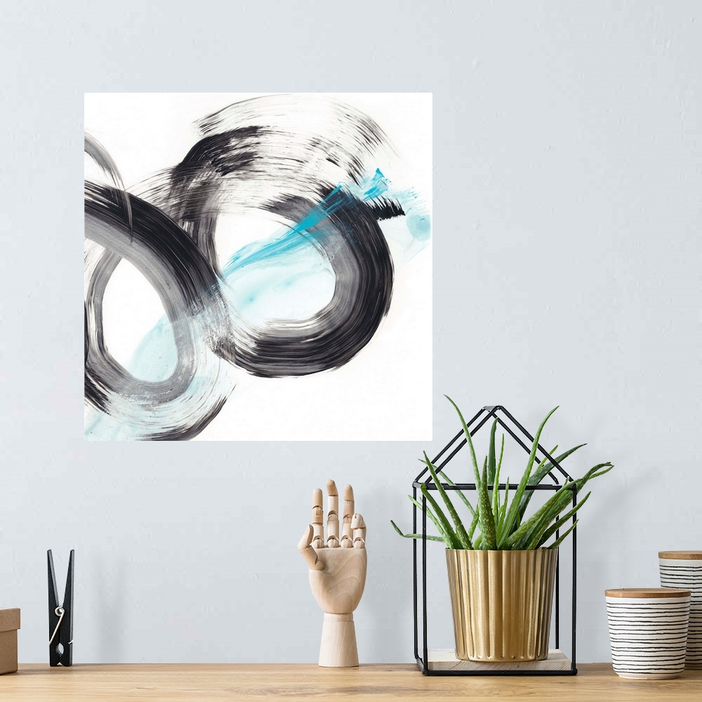 A bohemian room featuring Black and frosty blue spirals make up this dynamic contemporary abstract.