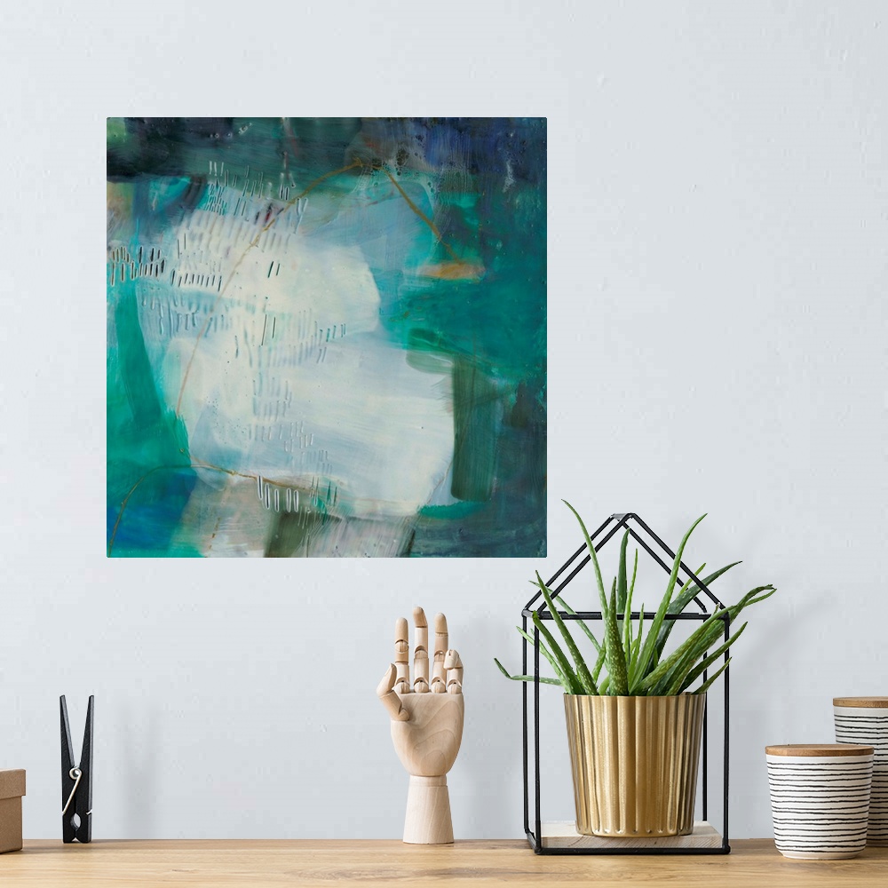 A bohemian room featuring A square abstract painting in varies shades of blue with overlapping brown scribbles and small ro...