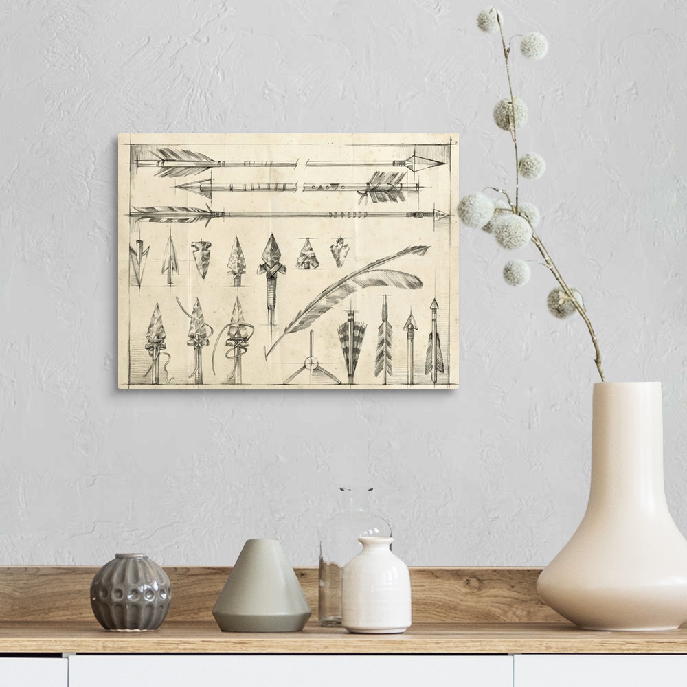 A farmhouse room featuring Detailed pencil illustration of several arrows and arrowheads.