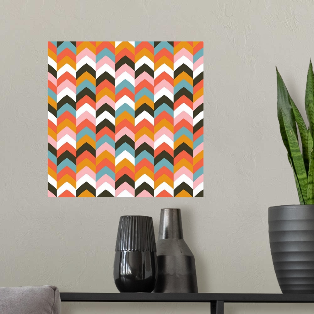 A modern room featuring Geometric artwork made from a chevron pattern.