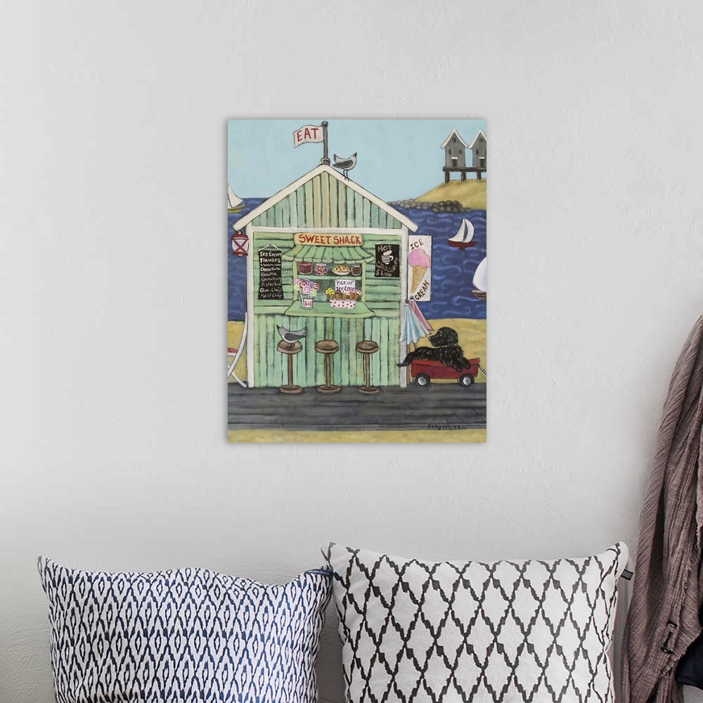 A bohemian room featuring Painting of a coastal environment with old beach town building.