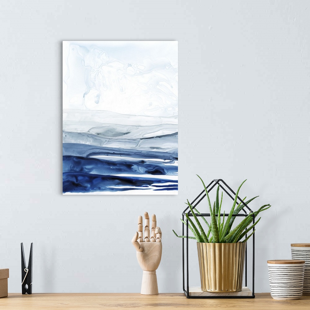 A bohemian room featuring Abstract contemporary painting resembling a deep blue ocean under a pale white sky.