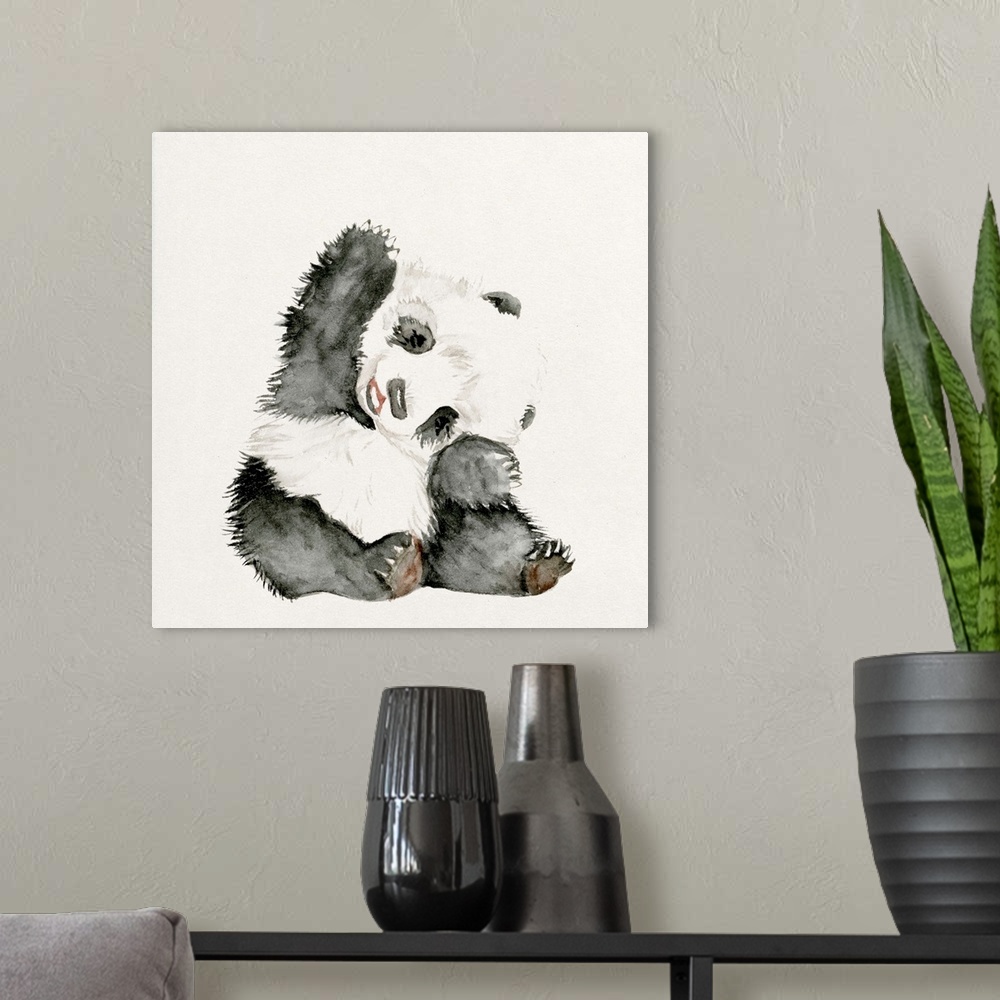 A modern room featuring Watercolor artwork of a cute baby panda waving.