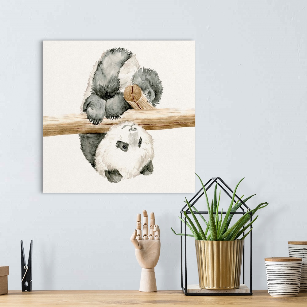A bohemian room featuring Watercolor artwork of a cute baby panda hanging from a branch.
