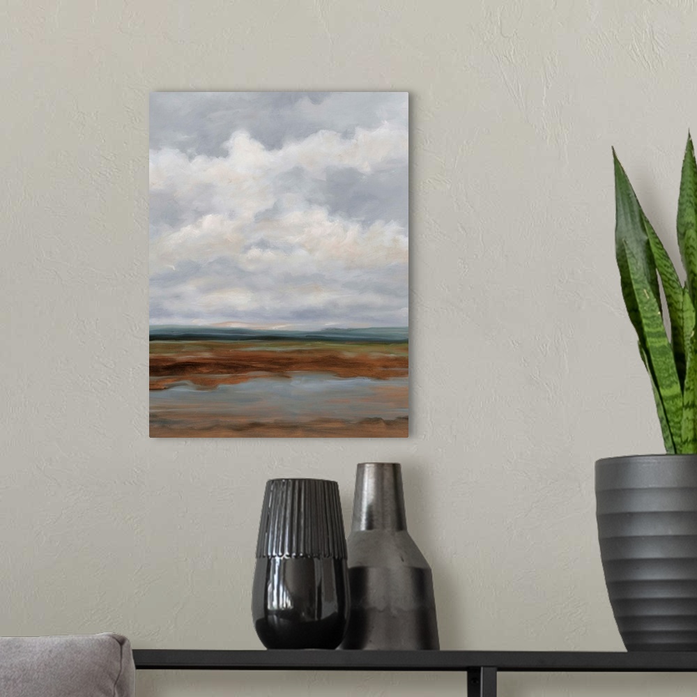 A modern room featuring Contemporary landscape painting with a sky filled with clouds.