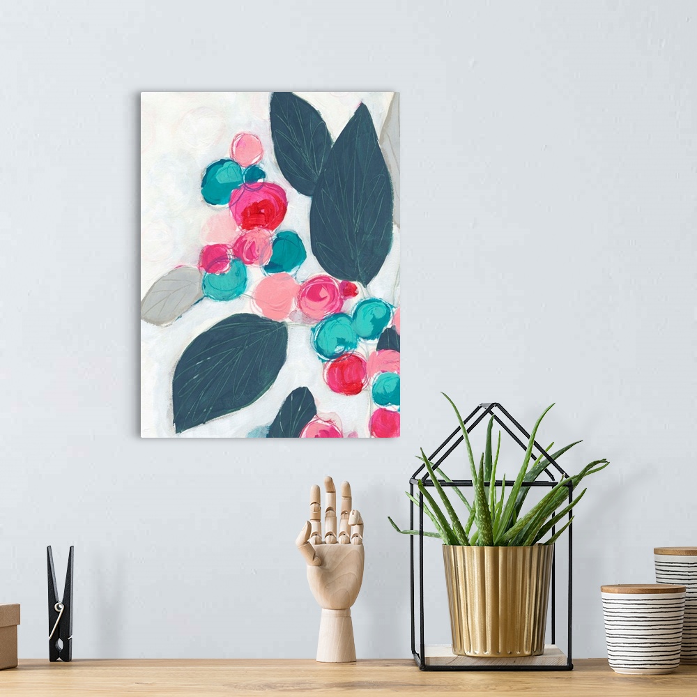 A bohemian room featuring Floral abstract painting in bright pink and teal on a light gray background.