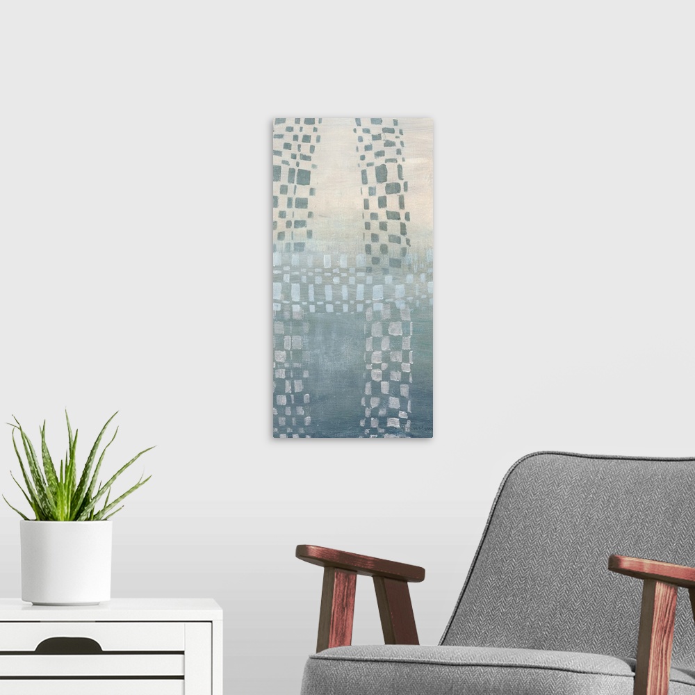 A modern room featuring Abstract painting of cascading geometric shapes in a muted blue against a split tone cream and bl...