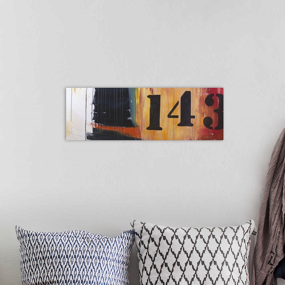 A bohemian room featuring Contemporary abstract painting using stenciled numbers against a patches of muted colors.