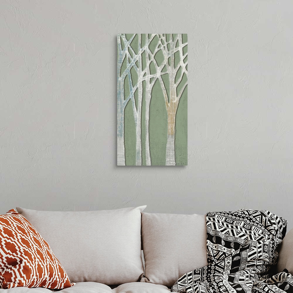 A bohemian room featuring Contemporary home decor art of a birch trees against a pale green background.